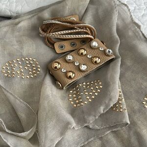 Necklace and two bracelets and a skull scarf